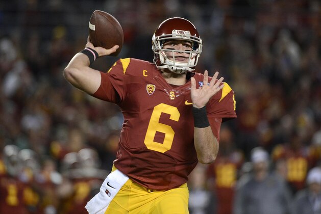 SAN DIEGO, CA -  DECEMBER 27:  Cody Kessler #6 of the USC Trojans throws a pass against the Nebraska Cornhuskers during the National University Holiday Bowl on December 27, 2014 at Qualcomm Stadium in San Diego, California. (Photo by Donald Miralle/Getty Images)