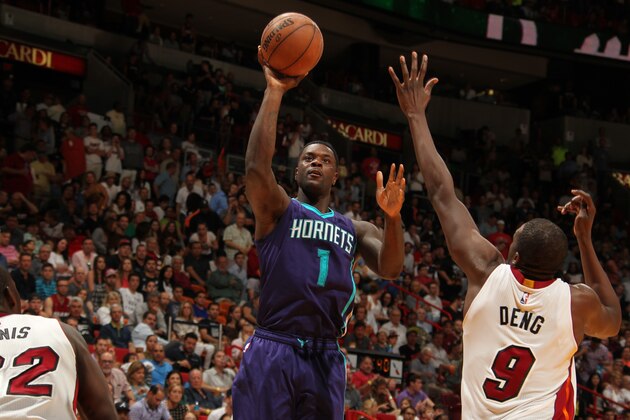 MIAMI, FL - APRIL 7:  Lance Stephenson #1 of the Charlotte Hornets shoots against the Miami Heat on April 7, 2015 at American Airlines Arena in Miami, Florida.  NOTE TO USER: User expressly acknowledges and agrees that, by downloading and or using this Photograph, user is consenting to the terms and conditions of the Getty Images License Agreement. Mandatory Copyright Notice: Copyright 2015 NBAE (Photo by Issac Baldizon/NBAE via Getty Images)