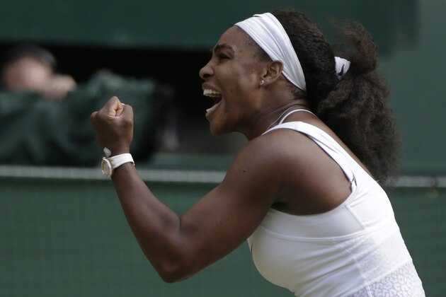 Serena Williams of the United States celebrates winning the singles match against Victoria Azarenka of Belarus, at the All England Lawn Tennis Championships in Wimbledon, London, Tuesday July 7, 2015. Williams won 3-6, 6-2, 6-3.  (AP Photo/Pavel Golovkin)