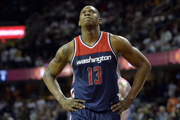 Apr 15, 2015; Cleveland, OH, USA; Washington Wizards center Kevin Seraphin (13) reacts in the fourth quarter against the Cleveland Cavaliers at Quicken Loans Arena. Mandatory Credit: David Richard-USA TODAY Sports