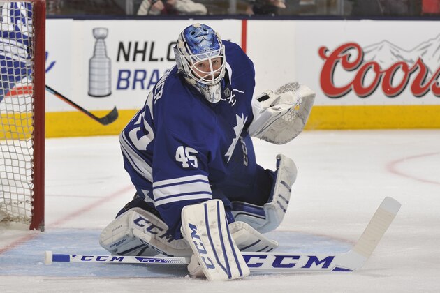 TORONTO, ON - APRIL 11:  Jonathan Bernier #45 of the Toronto Maple Leafs defends the goal during NHL game action against the Montreal Canadiens April 11, 2015 at the Air Canada Centre in Toronto, Ontario, Canada.  (Photo by Graig Abel/NHLI via Getty Images)
