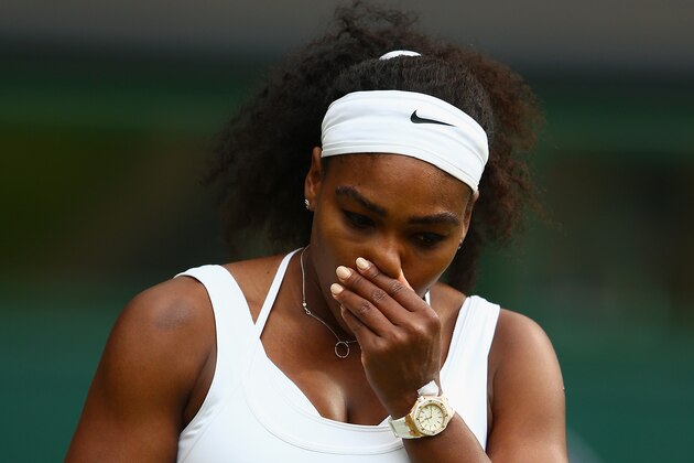 LONDON, ENGLAND - JULY 07:  Serena Williams of the United States reacts in her Ladies Singles Quarter Final match against Victoria Azarenka of Belarus during day eight of the Wimbledon Lawn Tennis Championships at the All England Lawn Tennis and Croquet Club on July 7, 2015 in London, England.  (Photo by Ian Walton/Getty Images)