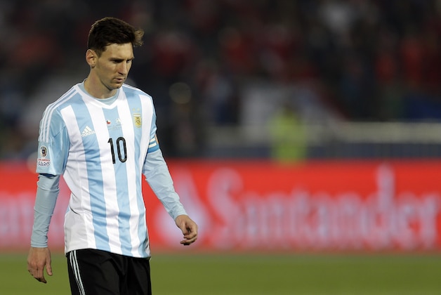 Argentina's Lionel Messi  looks on during penalty shootout at the Copa America final soccer match against Chile at the National Stadium in Santiago, Chile, Saturday, July 4, 2015. Chile won the Copa America on penalty shootout.(AP Photo/Natacha Pisarenko)