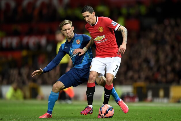 MANCHESTER, ENGLAND - MARCH 09: Angel di Maria of Manchester United is challenged by Nacho Monreal of Arsenal during the FA Cup Quarter Final match between Manchester United and Arsenal at Old Trafford on March 9, 2015 in Manchester, England. (Photo by Michael Regan/Getty Images) MANCHESTER, ENGLAND - MARCH 09: Angel di Maria of Manchester United is challenged by Nacho Monreal of Arsenal during the FA Cup Quarter Final match between Manchester United and Arsenal at Old Trafford on March 9, 2015 in Manchester, England. (Photo by Michael Regan/Getty Images)