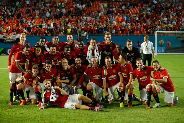 MIAMI GARDENS, FL - AUGUST 04:  Manchester United pose for a photograph following their victory over Liverpool in the Guinness International Champions Cup 2014 Final at Sun Life Stadium on August 4, 2014 in Miami Gardens, Florida. United defeated Liverpool 3-1.  (Photo by Chris Trotman/Getty Images)
