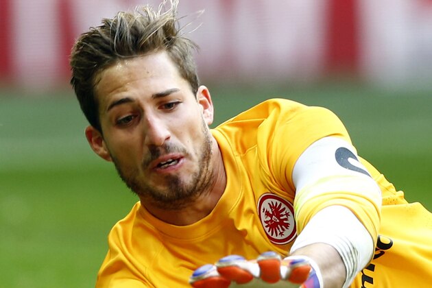 Frankfurt's goalkeeper Kevin Trapp saves the ball during the German first division Bundesliga soccer match between FC Bayern Munich and Eintracht Frankfurt in the Allianz Arena in Munich, Germany, on Saturday, April 11, 2015. (AP Photo/Matthias Schrader)