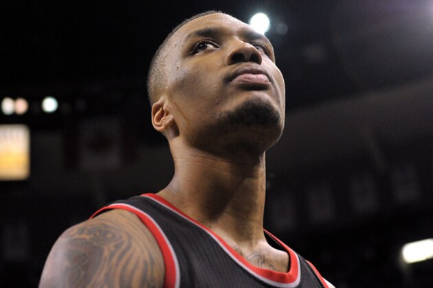 Portland Trail Blazers guard Damian Lillard leaves the court after his team lost an NBA basketball game Saturday, Jan. 17, 2015, in Memphis, Tenn. (AP Photo/Brandon Dill)