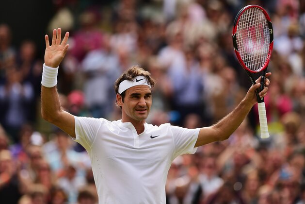 LONDON, ENGLAND - JULY 08:  Roger Federer of Switzerland celebrates winning at match point in his Gentlemens Singles Quarter Final match against Gilles Simon of France during day nine of the Wimbledon Lawn Tennis Championships at the All England Lawn Tennis and Croquet Club on July 8, 2015 in London, England.  (Photo by Shaun Botterill/Getty Images)