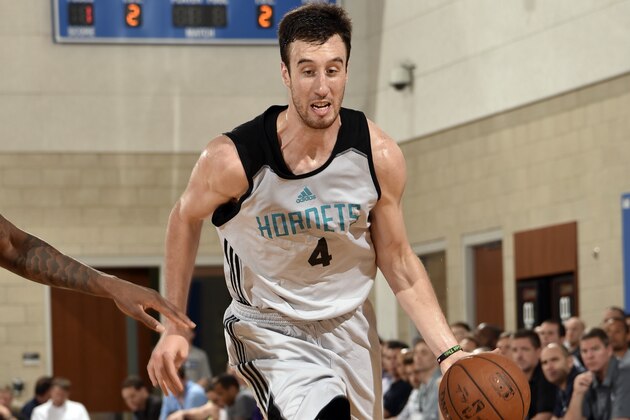 ORLANDO, FL - JULY 7: Frank Kaminsky #4 of the Charlotte Hornets drives to the basket against the Brooklyn Nets on July 7, 2015 at Amway Center in Orlando, Florida. NOTE TO USER: User expressly acknowledges and agrees that, by downloading and or using this photograph, User is consenting to the terms and conditions of the Getty Images License Agreement. Mandatory Copyright Notice: Copyright 2015 NBAE  (Photo by Fernando Medina/NBAE via Getty Images)