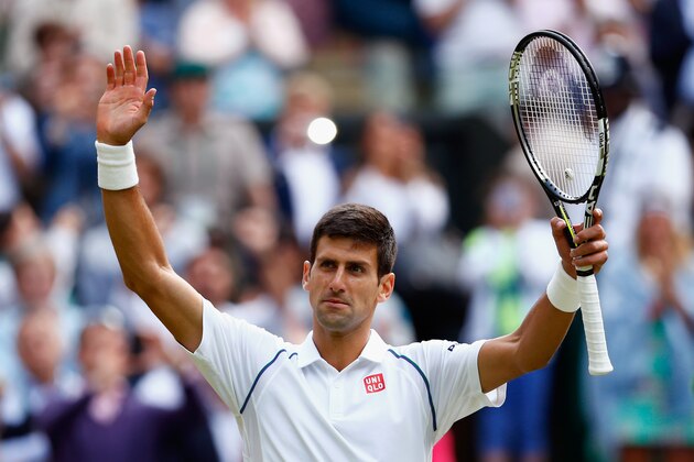 LONDON, ENGLAND - JULY 08:  Novak Djokovic of Serbia celebrates after winning his Gentlemens Singles Quarter Final match against Marin Cilic of Croatia during day nine of the Wimbledon Lawn Tennis Championships at the All England Lawn Tennis and Croquet Club on July 8, 2015 in London, England.  (Photo by Julian Finney/Getty Images)