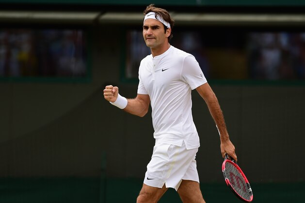 LONDON, ENGLAND - JULY 08:  Roger Federer of Switzerland celebrates winning a point in his Gentlemens Singles Quarter Final match against Gilles Simon of France during day nine of the Wimbledon Lawn Tennis Championships at the All England Lawn Tennis and Croquet Club on July 8, 2015 in London, England.  (Photo by Shaun Botterill/Getty Images)