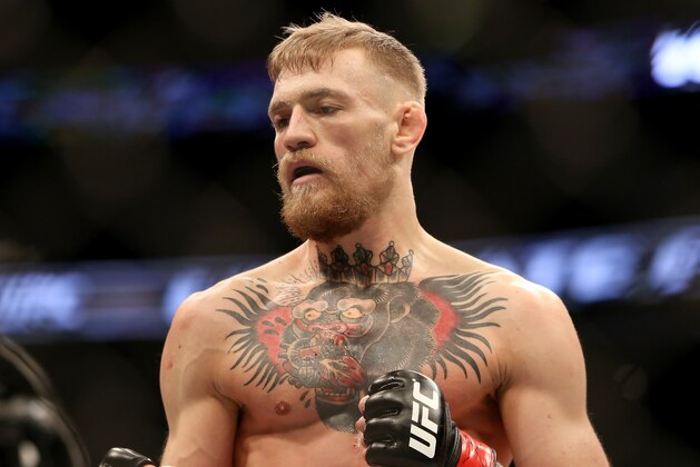 Conor McGregor in action against Denis Siver, during their featherweight fight at UFC Fight Night, Sunday, January 18, 2015 in Boston.  McGregor won via 2nd round TKO. (AP Photo/Gregory Payan)