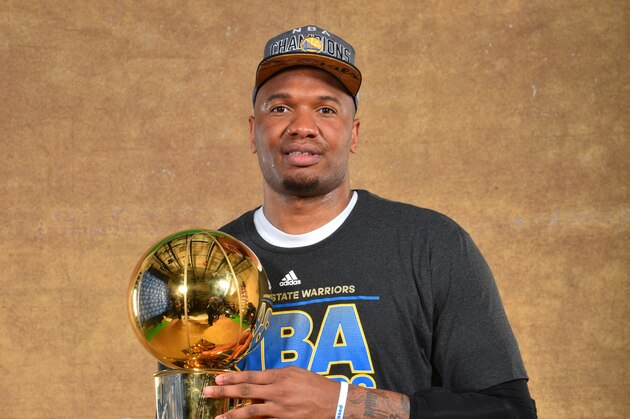 CLEVELAND, OH - JUNE 16: Marreese Speights #5 of the Golden State Warriors poses for a portrait with the Larry O'Brien trophy after defeating the Cleveland Cavaliers in Game Six of the 2015 NBA Finals on June 16, 2015 at Quicken Loans Arena in Cleveland, Ohio. NOTE TO USER: User expressly acknowledges and agrees that, by downloading and or using this photograph, user is consenting to the terms and conditions of Getty Images License Agreement. Mandatory Copyright Notice: Copyright 2015 NBAE (Photo by Jesse D. Garrabrant/NBAE via Getty Images)