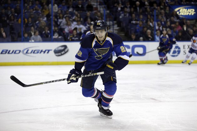St. Louis Blues' Kevin Shattenkirk chases after a loose puck during the first period of an NHL hockey game against the Edmonton Oilers Friday, March 1, 2013, in St. Louis. (AP Photo/Jeff Roberson)