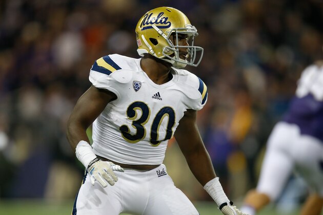 SEATTLE, WA - NOVEMBER 08:  Linebacker Myles Jack #30 of the UCLA Bruins defends against the Washington Huskies on November 8, 2014 at Husky Stadium in Seattle, Washington.  (Photo by Otto Greule Jr/Getty Images)