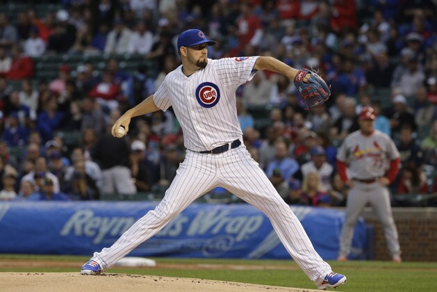 Chicago Cubs starter Jason Hammel throws against the St. Louis Cardinals during the first inning of a baseball game Wednesday, July 8, 2015, in Chicago. (AP Photo/Nam Y. Huh)