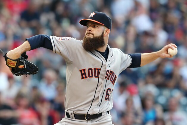 Houston Astros starting pitcher Dallas Keuchel pitches to Cleveland Indians' Yan Gomes during the second inning of a baseball game, Monday, July 6, 2015, in Cleveland. (AP Photo/Ron Schwane)