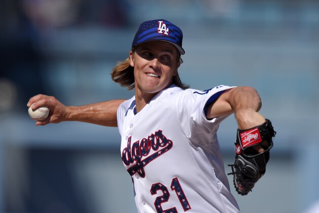Los Angeles Dodgers starting pitcher Zack Greinke throws to the plate during the first inning of a baseball game against the New York Mets, Saturday, July 4, 2015, in Los Angeles. (AP Photo/Mark J. Terrill)