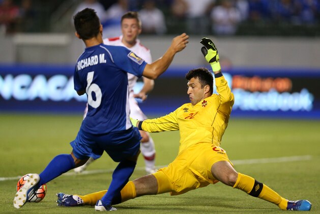 LOS ANGELES, CA - JULY 08:   Goalkeeper Kryiakos Stamatopolous #22 of Canada kicks the ball away from Ricahrd Menjivar #6 of El Salvador in their CONCACAF Gold Cup Group B match at StubHub Center on July 8, 2015 in Los Angeles, California.  (Photo by Stephen Dunn/Getty Images)