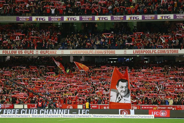 MELBOURNE, AUSTRALIA - JULY 24:  Liverpool fans show their support during the match between the Melbourne Victory and Liverpool at Melbourne Cricket Ground on July 24, 2013 in Melbourne, Australia.  (Photo by Michael Dodge/Getty Images)