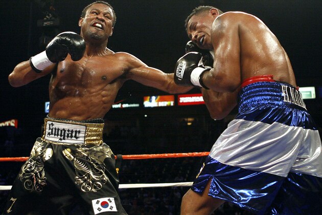 ** FILE ** In this Sept. 27, 2008 file photo, Shane Mosley, left, connects with left to the body of Ricardo Mayorga, of Nicaragua, in the 8th round of a junior middleweight boxing match in Carson, Calif. Mosley told a grand jury in 2003 that he injected himself with the doping agent EPO as he prepared for a fight against Oscar De La Hoya, according to court transcripts and doping calendars reviewed by the New York Daily News. (AP Photo/Gus Ruelas, File)