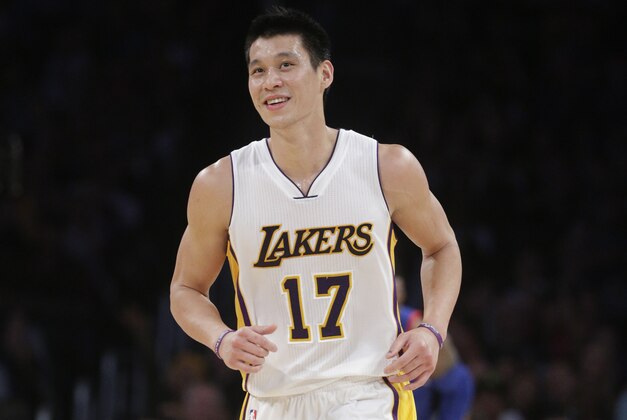 Los Angeles Lakers' Jeremy Lin smiles after making a basket against the Philadelphia 76ers during the second half of an NBA basketball game, Sunday, March 22, 2015, in Los Angeles. The Lakers 101-87. (AP Photo/Jae C. Hong)