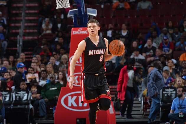 PHILADELPHIA,PA - APRIL 15: Tyler Johnson #8 of the Miami Heat dribbles up court against the Philadelphia 76ers at Wells Fargo Center on April 15, 2015 in Philadelphia, Pennsylvania NOTE TO USER: User expressly acknowledges and agrees that, by downloading and/or using this Photograph, user is consenting to the terms and conditions of the Getty Images License Agreement. Mandatory Copyright Notice: Copyright 2015 NBAE (Photo by Jesse D. Garrabrant/NBAE via Getty Images)
