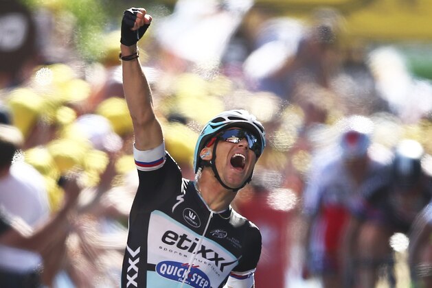 Zdenek Stybar of the Czech Republic crosses the finish line to win the sixth stage of the Tour de France cycling race over 191.5 kilometers (119 miles) with start in Abbeville and finish in Le Havre, France, Thursday, July 9, 2015. (AP Photo/Peter Dejong)