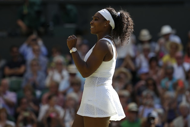 Serena Williams of the United States celebrates as she defeats Maria Sharapova of Russia in their women's singles semifinal match at the All England Lawn Tennis Championships in Wimbledon, London, Thursday July 9, 2015. Williams won 6-2, 6-4.  (AP Photo/Alastair Grant)