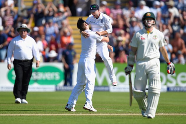 CARDIFF, WALES - JULY 09:  Australia batsman Chris Rogers leaves the field after being dismissed for 95 as bowler Mark Wood and Adam Lyth celebrate during day two of the 1st Investec Ashes Test match between England and Australia at SWALEC Stadium on July 9, 2015 in Cardiff, United Kingdom.  (Photo by Stu Forster/Getty Images)
