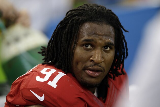 San Francisco 49ers' Ray McDonald (91) sits on the bench during the second half of an NFL football game against the Dallas Cowboys, Sunday, Sept. 7, 2014, in Arlington, Texas. (AP Photo/LM Otero)