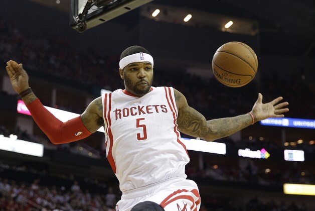 Houston Rockets' Josh Smith dunks during the second half of Game 2 in an NBA basketball first-round playoff series against the Dallas Mavericks, Tuesday, April 21, 2015, in Houston. (AP Photo/David J. Phillip)