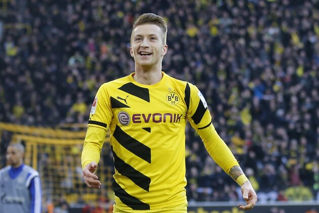 Dortmund's Marco Reus during the German first division Bundesliga soccer match between BvB Borussia Dortmund  and Schalke 04 in Dortmund, Germany, Saturday, Feb. 28, 2015. (AP Photo/Frank Augstein)