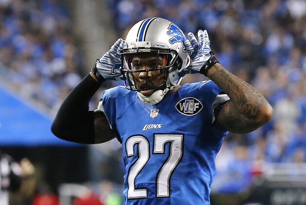 Detroit Lions free safety Glover Quin (27) reacts to the crowd against the Minnesota Vikings during an NFL football game in Detroit Sunday, Dec. 14, 2014. (AP Photo/Paul Sancya)