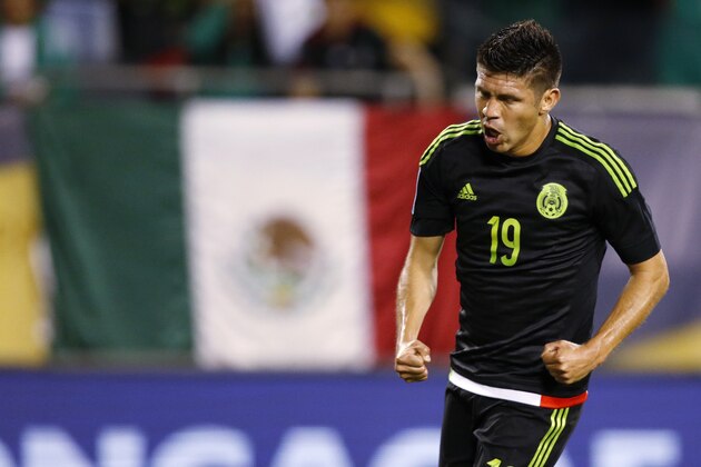 Mexico forward Oribe Peralta celebrates his goal against Cuba during the first half of a CONCACAF Gold Cup soccer match, Thursday, July 9, 2015, in Chicago. (AP Photo/Andrew A. Nelles)