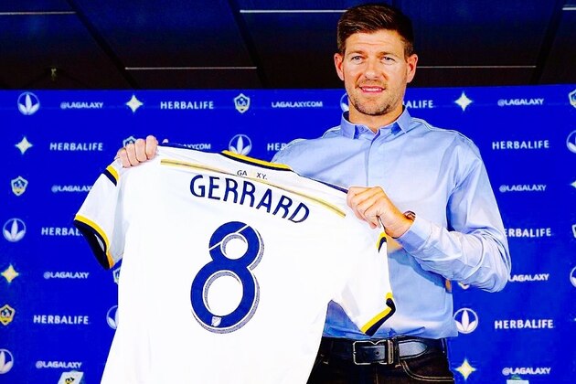 CARSON, CA - JULY 7: New Los Angeles Galaxy midfielder Steven Gerrard #8 poses with his jersey after a news conference on July 7, 2015 at StubHub Center in Carson, California. The former Liverpool captain Steven Gerrard is scheduled to play his first MLS match on Friday, July 17 at StubHub Center against San Jose Earthquakes. (Photo by Kevork Djansezian/Getty Images)