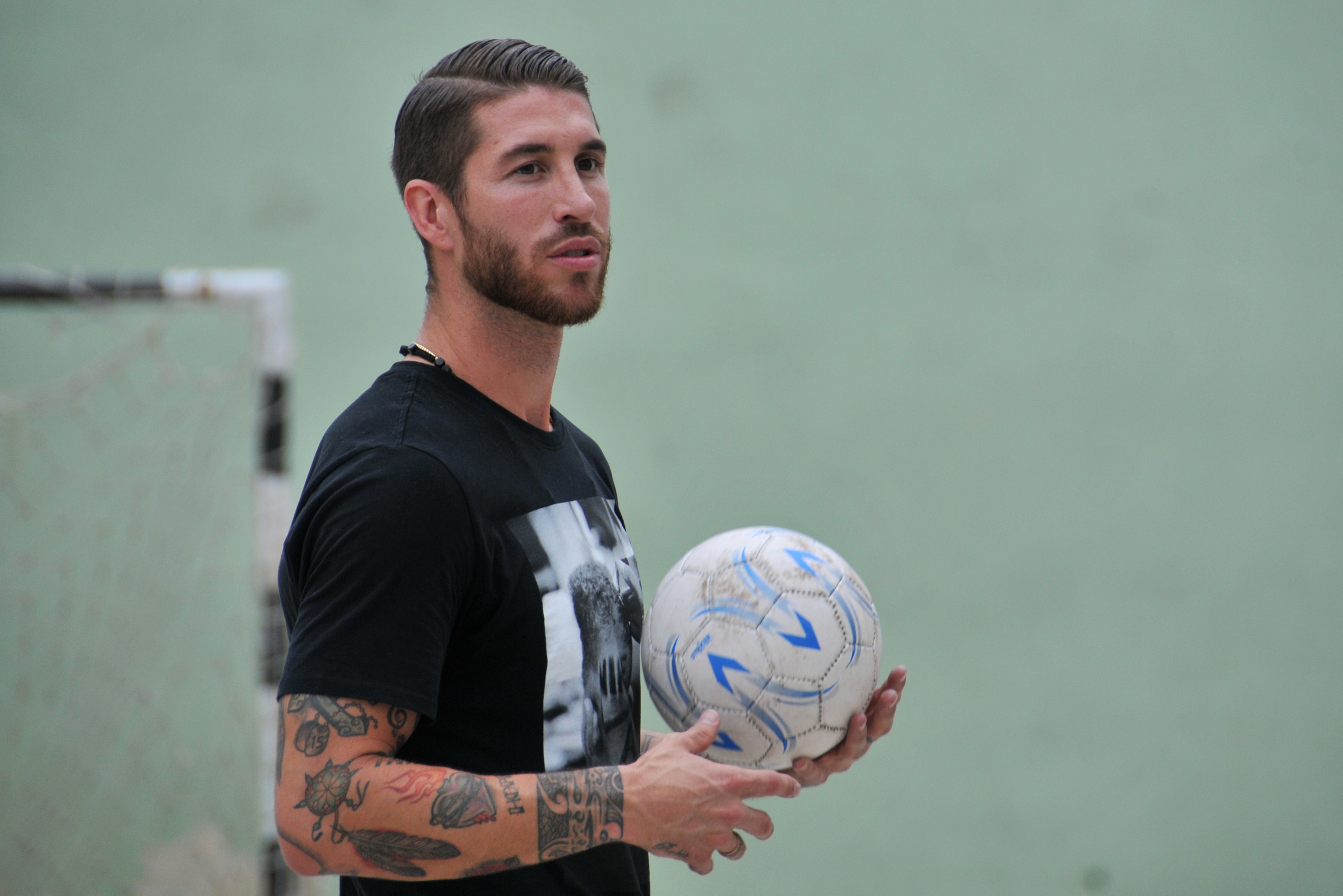 UNICEF ambassador Sergio Ramos, of Spain's national soccer team and Real Madrid holds a soccer ball during an exhibition match in Havana, Cuba, Monday, June 16, 2015.  (AP Photo/Ladyrene Perez, Cubadebate)