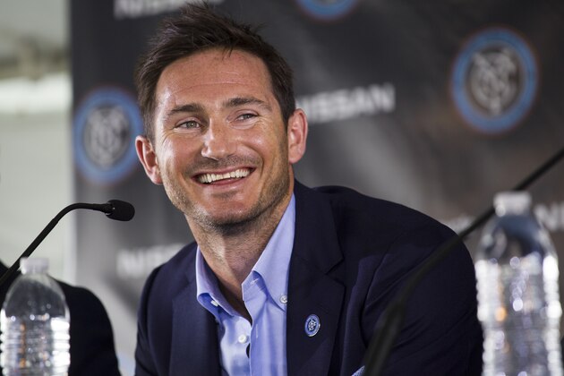 FILE - In this July 24, 2014, file photo, Frank Lampard, of England, smiles during his introduction as a member of the MLS expansion club New York City FC  in New York. Lampard will also delay his move to the MLS by finishing the season with Manchester City. (AP Photo/Craig Ruttle, File)