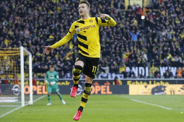 Dortmund's Marco Reus during the German first division Bundesliga soccer match between BvB Borussia Dortmund  and Schalke 04 in Dortmund, Germany, Saturday, Feb. 28, 2015. (AP Photo/Frank Augstein)