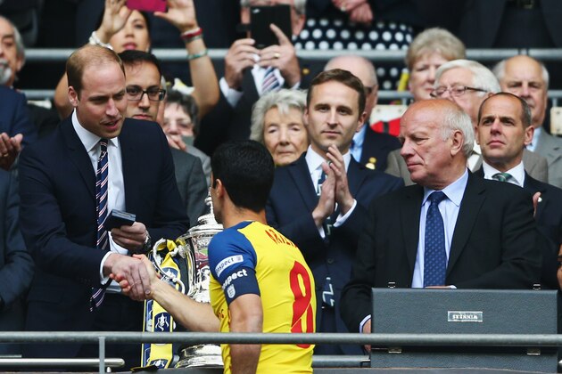 LONDON, ENGLAND - MAY 30: Prince William, Duke of Cambridge hands the trophy to Mikel Arteta of Arsenal following the FA Cup Final between Aston Villa and Arsenal at Wembley Stadium on May 30, 2015 in London, England. Arsenal beat Aston Villa 4-0. (Photo by Paul Gilham/Getty Images) LONDON, ENGLAND - MAY 30: Prince William, Duke of Cambridge hands the trophy to Mikel Arteta of Arsenal following the FA Cup Final between Aston Villa and Arsenal at Wembley Stadium on May 30, 2015 in London, England. Arsenal beat Aston Villa 4-0. (Photo by Paul Gilham/Getty Images)