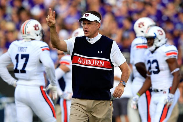 MANHATTAN, KS - SEPTEMBER 18:  Head coach Gus Malzahn of the Auburn Tigers watches pre-game warm-ups prior to the game against the Kansas State Wildcats at Bill Snyder Family Football Stadium on September 18, 2014 in Manhattan, Kansas.  (Photo by Jamie Squire/Getty Images)