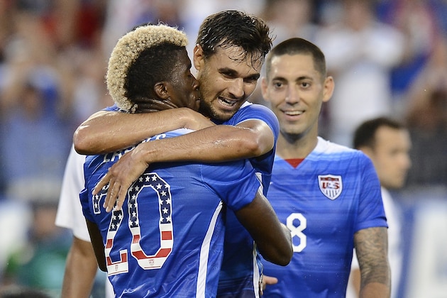 U.S. midfielder Gyasi Zardes (20) celebrates with Chris Wondolowski, center, after Wondolowski scored against Guatemala during the second half of an international friendly soccer match Friday, July 3, 2015, in Nashville, Tenn. At right is Clint Dempsey (8). The United States won 4-0. (AP Photo/Mark Zaleski)