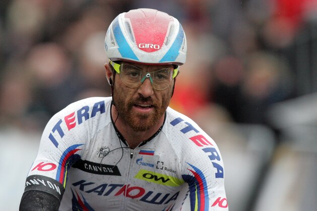 Luca Paolini, of the team Katusha sprints towards the finish line to win the Belgian cycling classic 'Ghent-Wevelgem', part of the UCI World Tour, in Wevelgem, western Belgium, Sunday, March 29, 2015. Niki Terpstra, of the team Etixx-Quick Step, placed second and Geraint Thomas, of the team Sky, placed third. (AP Photo/Francois Walschaerts)
