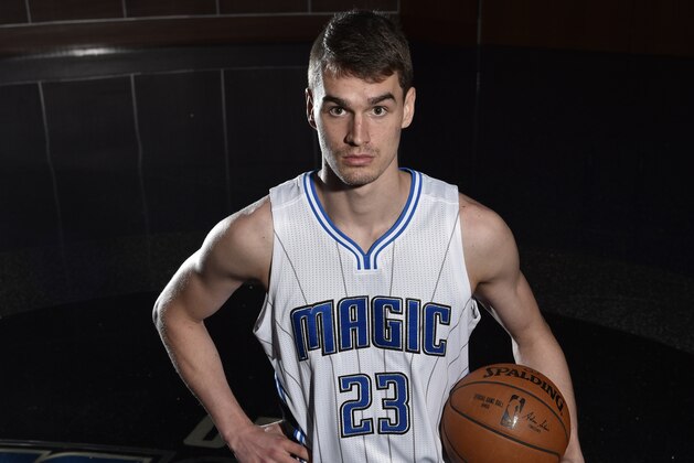 ORLANDO, FL - JULY 02:  Mario Hezonja #23 of the Orlando Magic poses for a portrait on July 2, 2015 at Amway Center in Orlando, Florida. NOTE TO USER: User expressly acknowledges and agrees that, by downloading and or using this photograph, User is consenting to the terms and conditions of the Getty Images License Agreement. Mandatory Copyright Notice: Copyright 2015 NBAE  (Photo by Fernando Medina/NBAE via Getty Images)