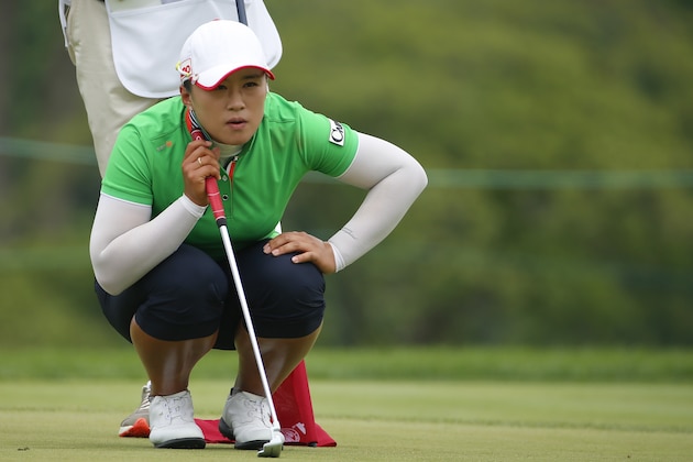 Amy Yang of South Korea lines up a putt along the ninth green during the first round of the U.S. Women's Open golf tournament at Lancaster Country Club, Thursday, July 9, 2015 in Lancaster, Pa. (AP Photo/Gene J. Puskar)