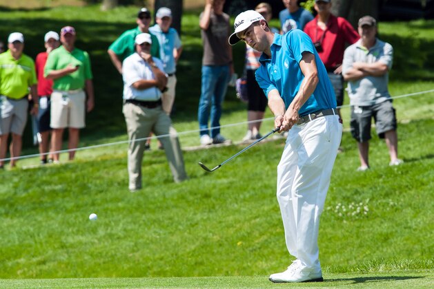 Jul 10, 2015; Silvis, IL, USA; Justin Thomas chips onto the 9th green during the second round at the John Deere Classic at TPC Deere Run. Mandatory Credit: Jeffrey Becker-USA TODAY Sports