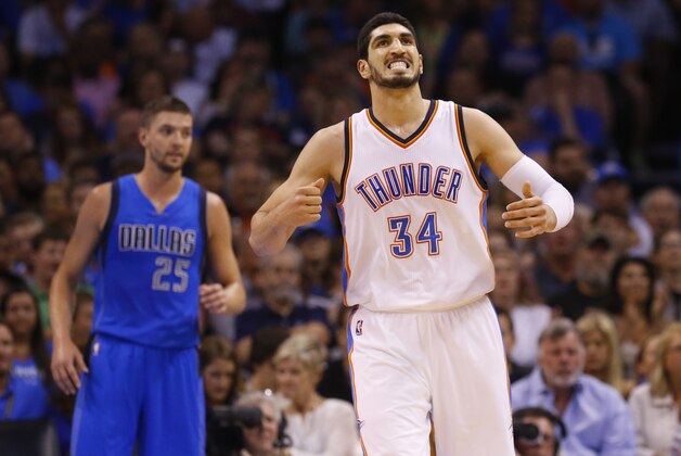 Oklahoma City Thunder center Enes Kanter (34) reacts after being fouled in the first quarter of an NBA basketball game against the Dallas Mavericks in Oklahoma City, Wednesday, April 1, 2015. (AP Photo/Sue Ogrocki)