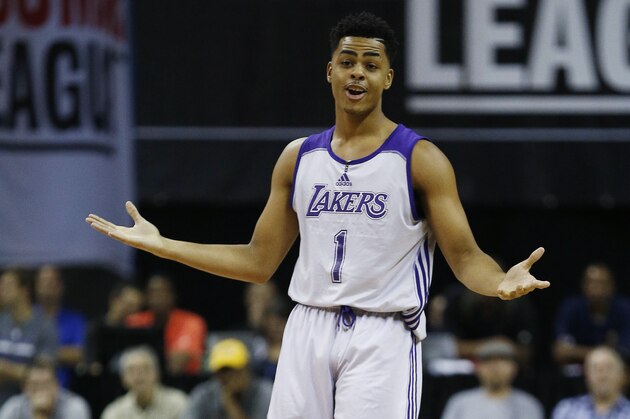 Los Angeles Lakers’ D'Angelo Russell reacts after scoring against the Minnesota Timberwolves during the first half of their NBA summer league basketball game Friday, July 10, 2015, in Las Vegas. (AP Photo/John Locher)