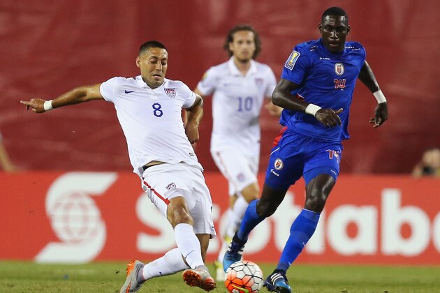 FOXBORO, MA - JULY 10:  Duckens Nazon #14 of Haiti defends Clint Dempsey #8 of United States during the 2015 CONCACAF  Gold Cup match between United States and Haiti at Gillette Stadium on July 10, 2015 in Foxboro, Massachusetts.  (Photo by Maddie Meyer/Getty Images)
