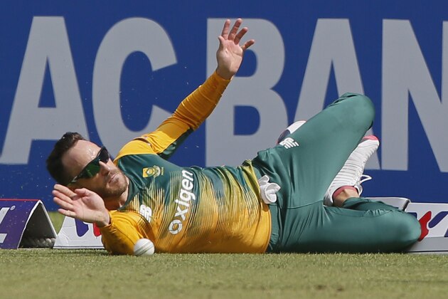 South Africa’s captain Faf du Plessis drives to stop the ball as he fields against Bangladesh during their second Twenty20 international cricket match in Dhaka, Bangladesh, Tuesday, July 7, 2015. (AP Photo/ A.M. Ahad)